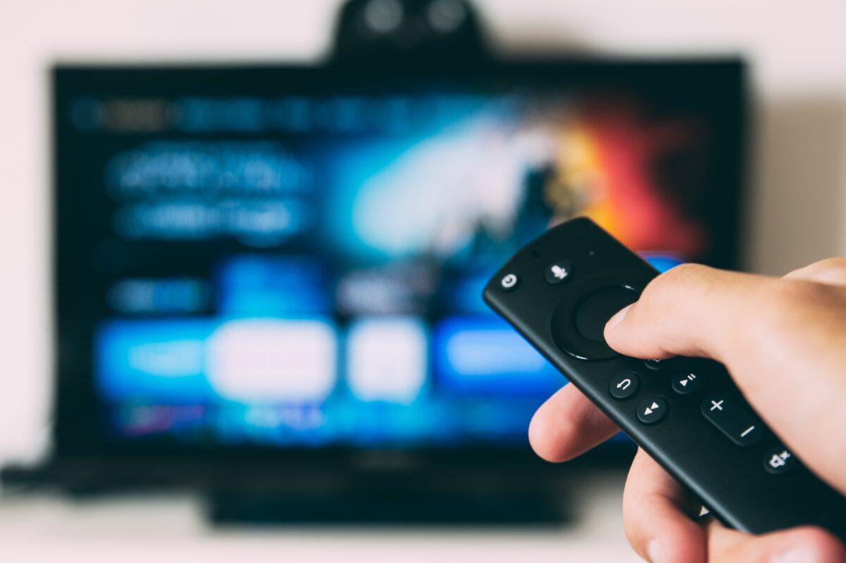 Silhouette TV with Remote Stock Photo